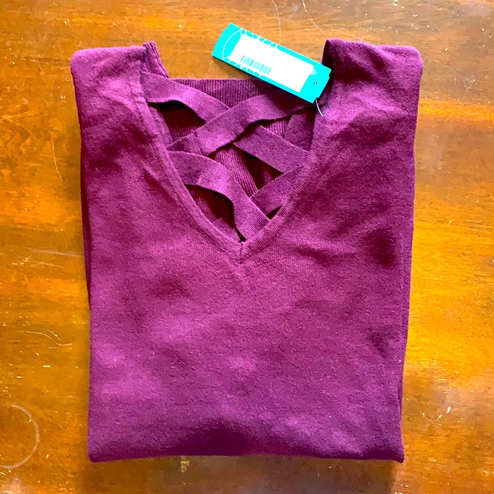 Burgundy sweater with crisscross detail